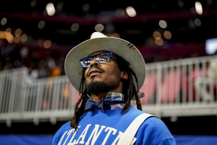 Cam Newton watches play between Howard and Florida A&M during the first half of an NCAA Celebration Bowl football game, Dec. 16, 2023, in Atlanta. A video surfaced Sunday, Feb. 25, 2024, that appeared to show Newton being involved in a scuffle at a 7-on-7 youth football tournament in Atlanta. (AP Photo/Mike Stewart, File)